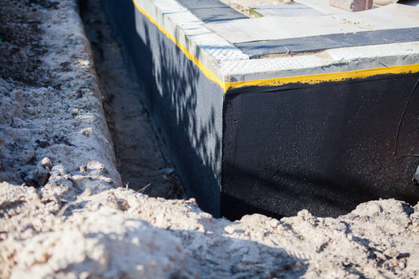 Professional Exterior Waterproofing technician working in Onward, IN